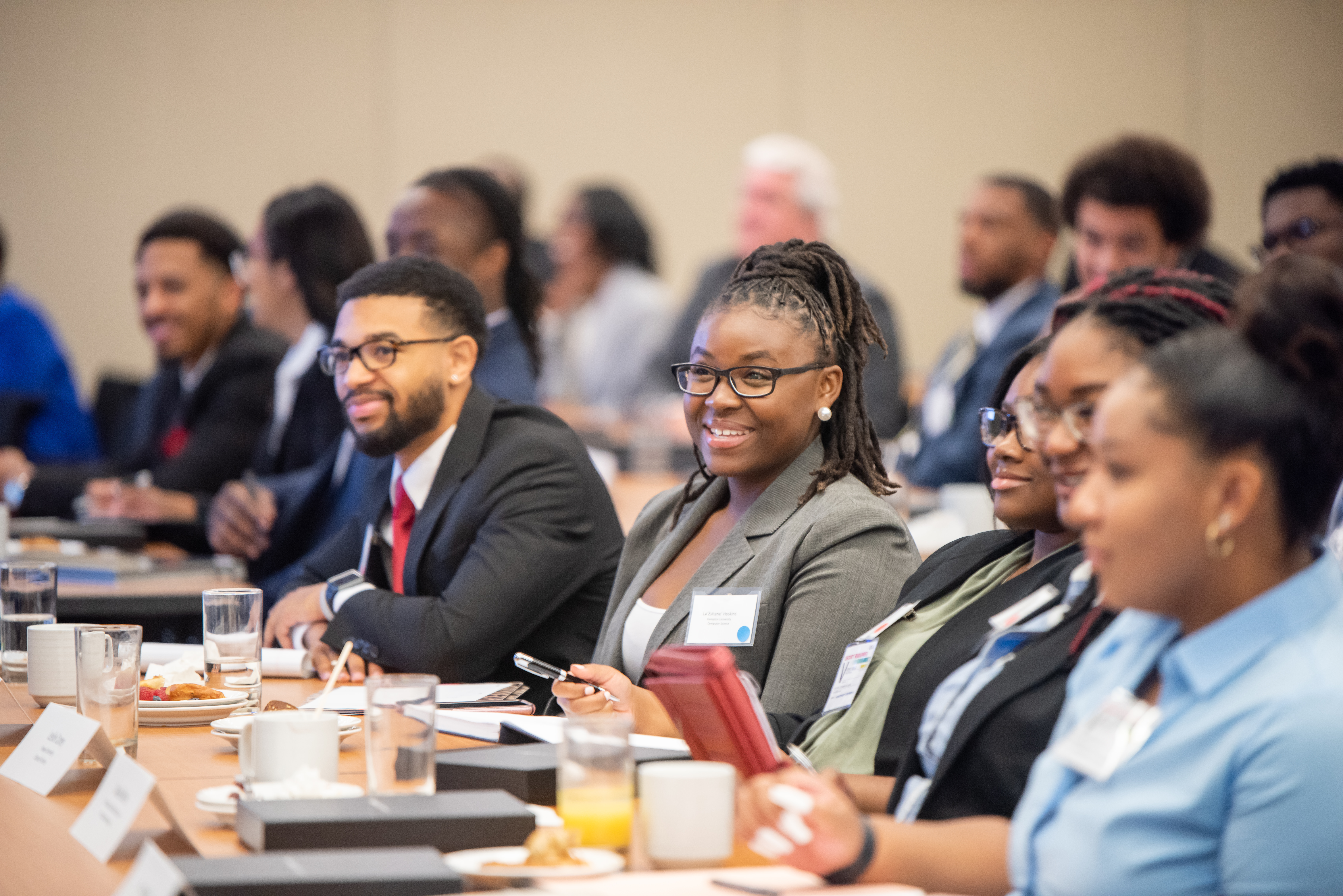 Zoomed image of female smiling in crowd