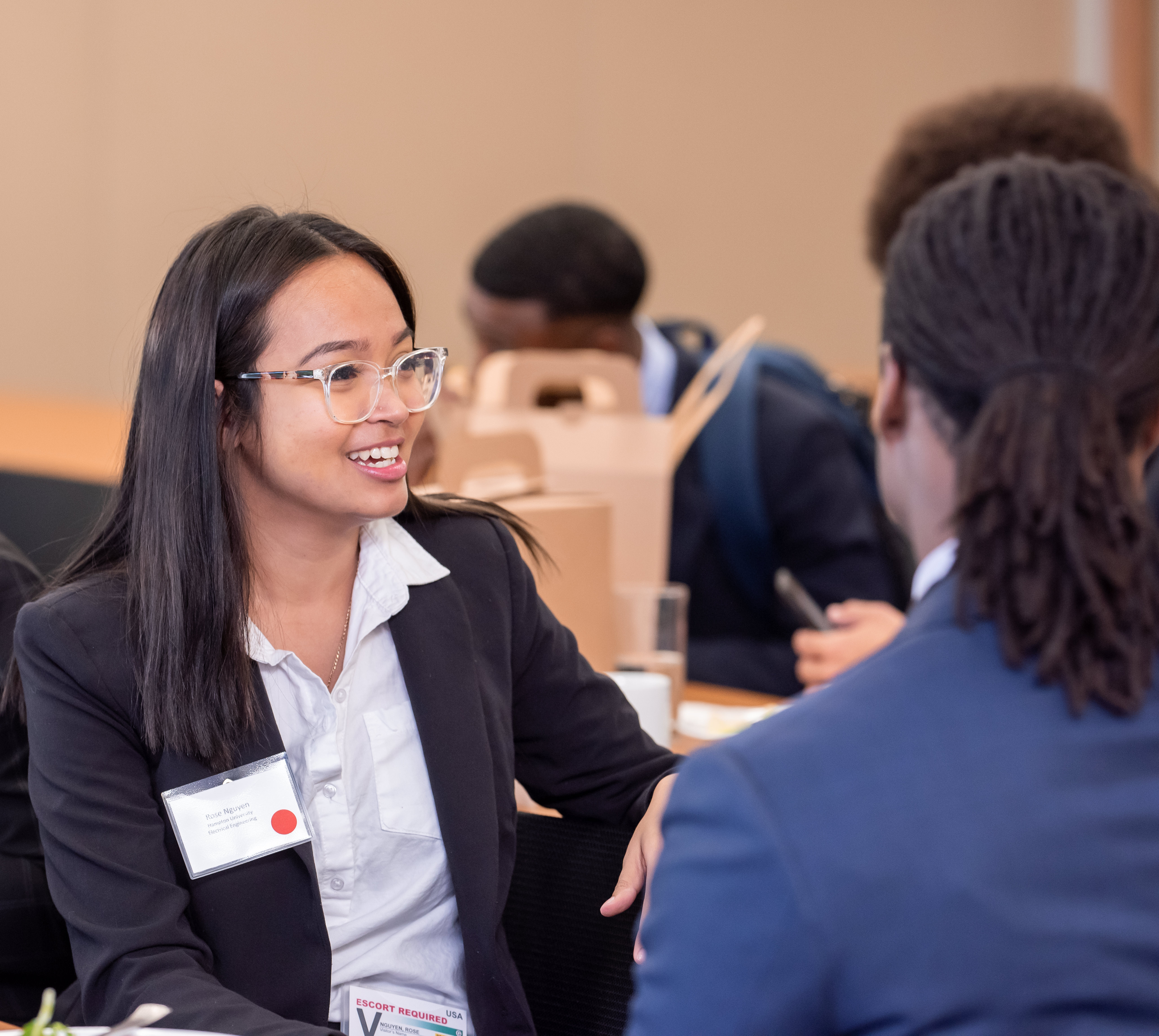 Young female with glasses smiling