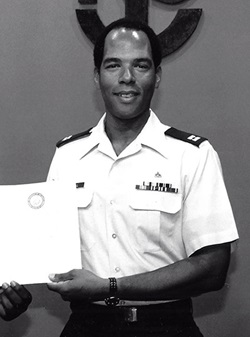 man holding a certificate