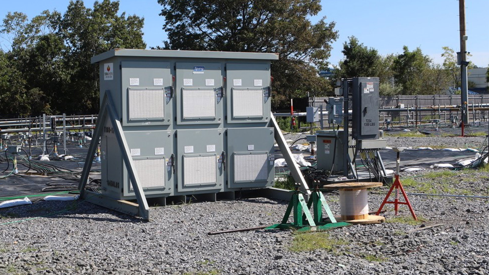 six grey storage boxes