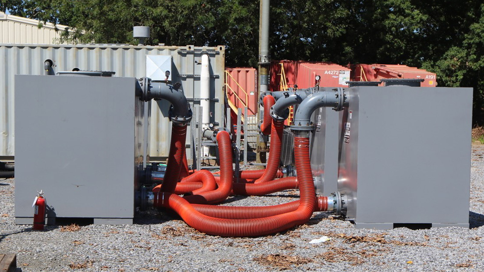 red pipes coming out of grey boxes